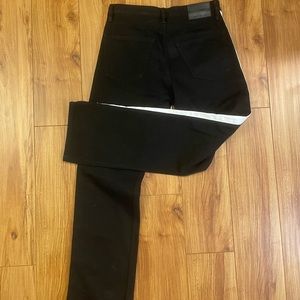 Calvin Klein black jeans with white stripe